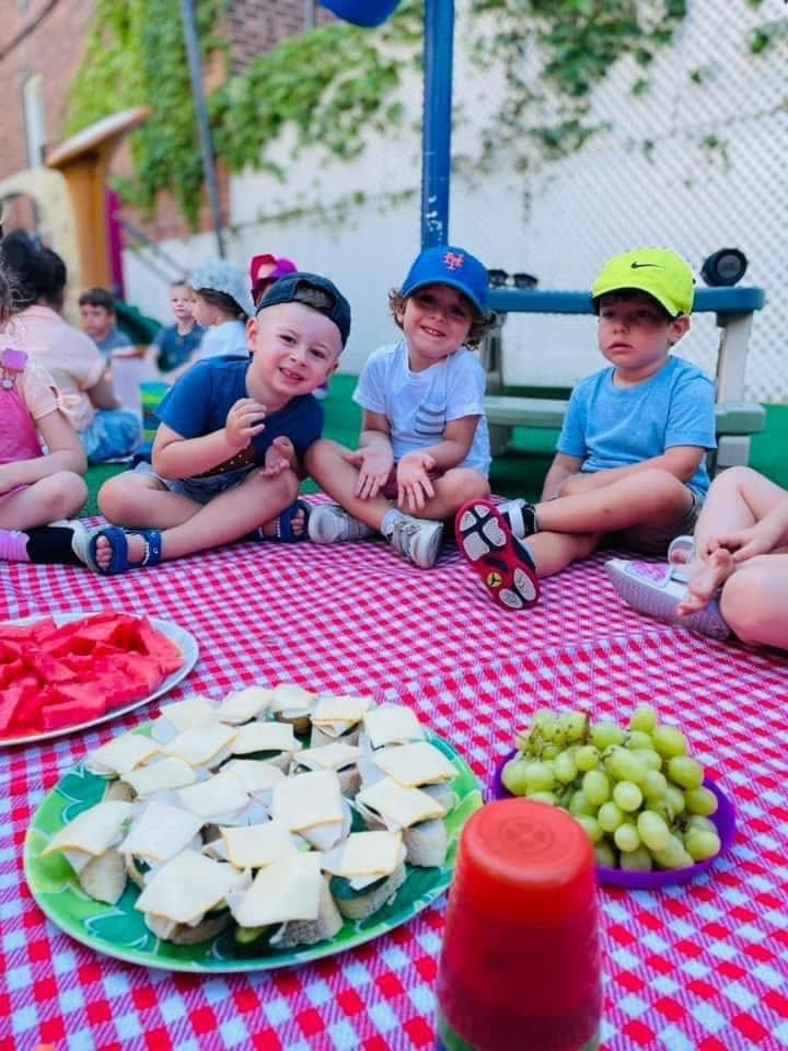 Children enjoying a summer picnic together